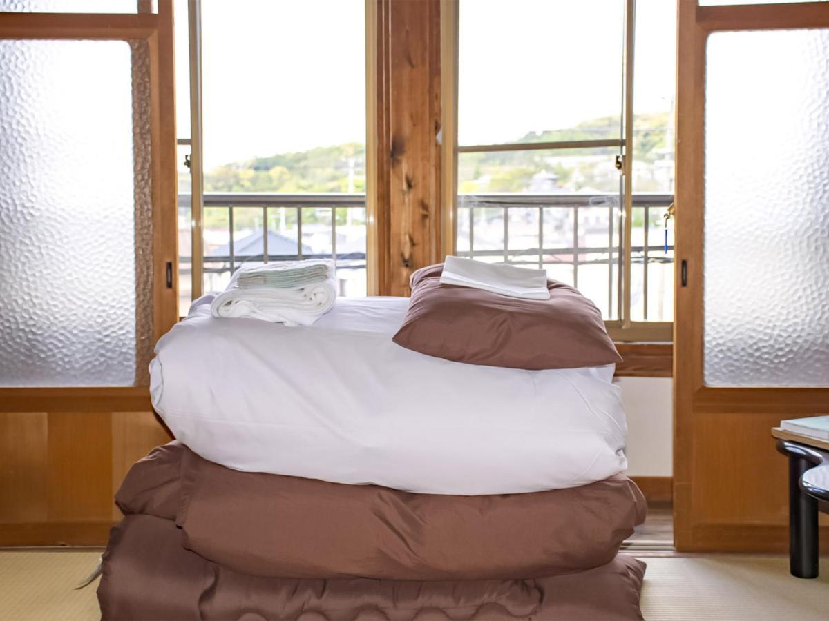 Guest Cafe Kuchikumano Hotel Kamitondacho Eksteriør billede