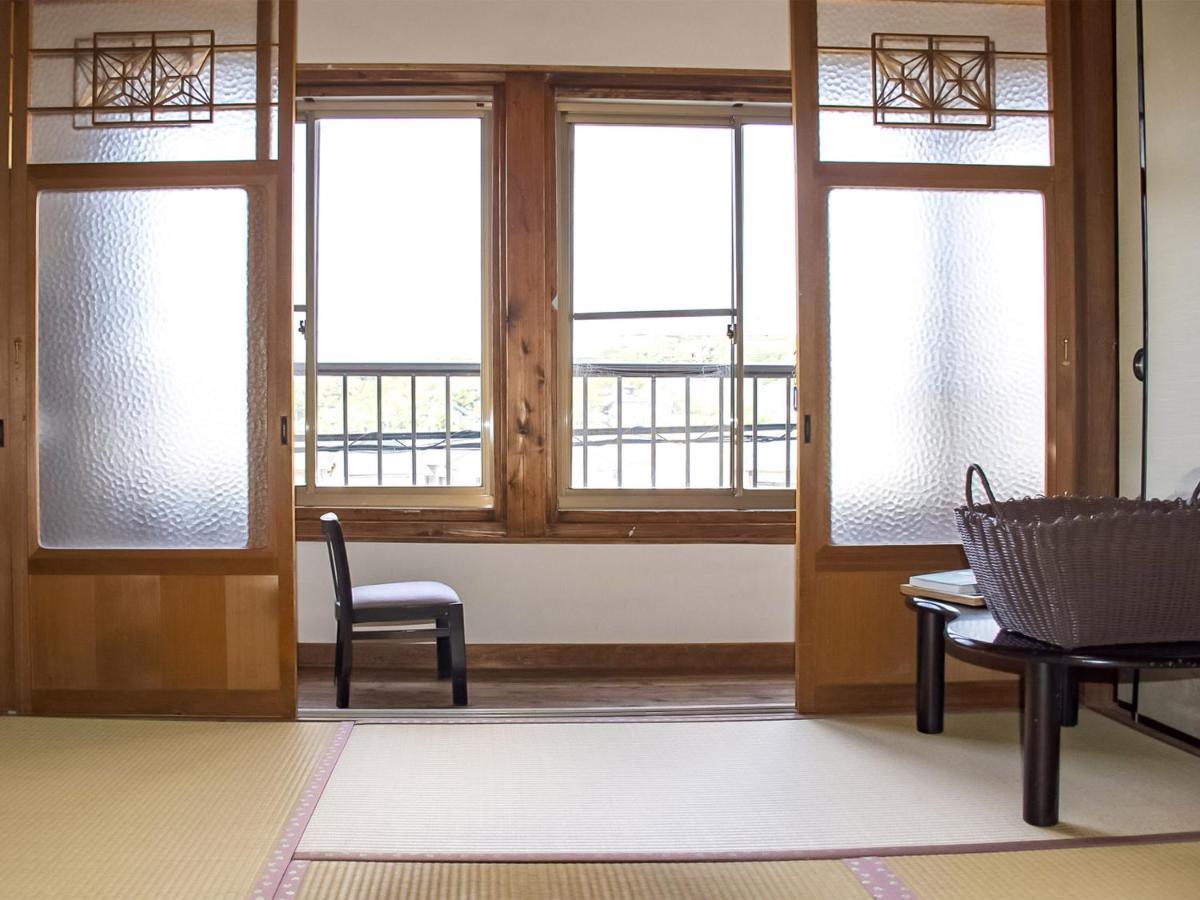 Guest Cafe Kuchikumano Hotel Kamitondacho Eksteriør billede
