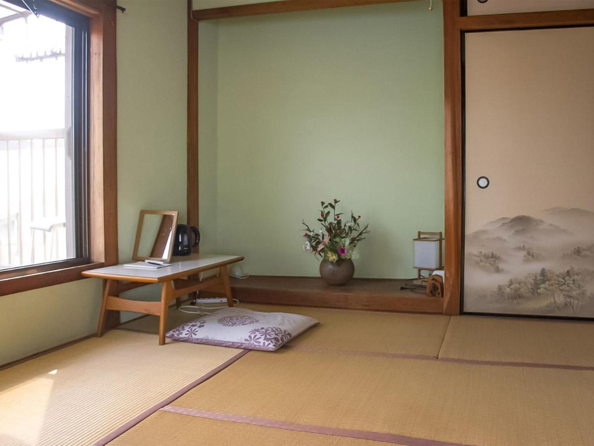Guest Cafe Kuchikumano Hotel Kamitondacho Eksteriør billede